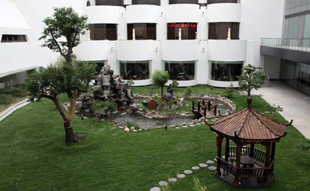 Beijing International Hotel Pokoj fotografie